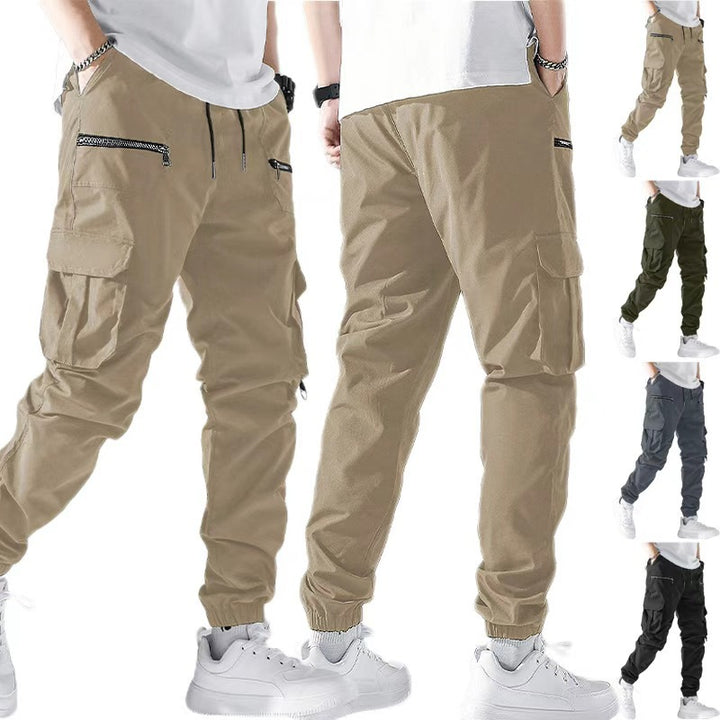 Men's slim cargo joggers with multiple zippered pockets, elastic ankle cuff, and drawstring StylebySassy