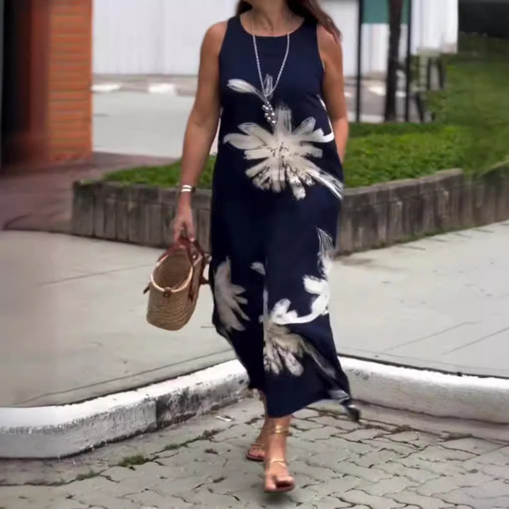 Women sleeveless casual maxi dress made of lightweight jersey with large brush flower pattern and hidden side pockets StylebySassy