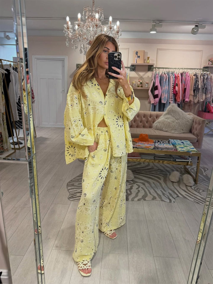 Women's airy lace embroidery beach two-piece set with oversized shirt, chest pocket, and wide palazzo pants StylebySassy