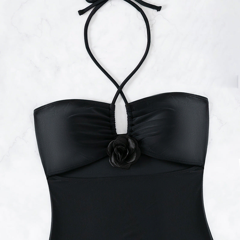 Women's one-piece swimsuit with decorative wrap detail and cut-out design StylebySassy
