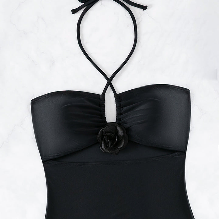 Women's one-piece swimsuit with decorative wrap detail and cut-out design StylebySassy