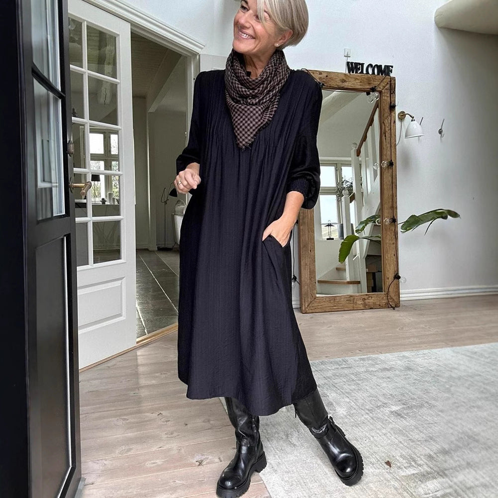 Ladies' loose midi dress with fine pleated look, stand-up collar, short button placket, smocked cuffs, and side pockets StylebySassy