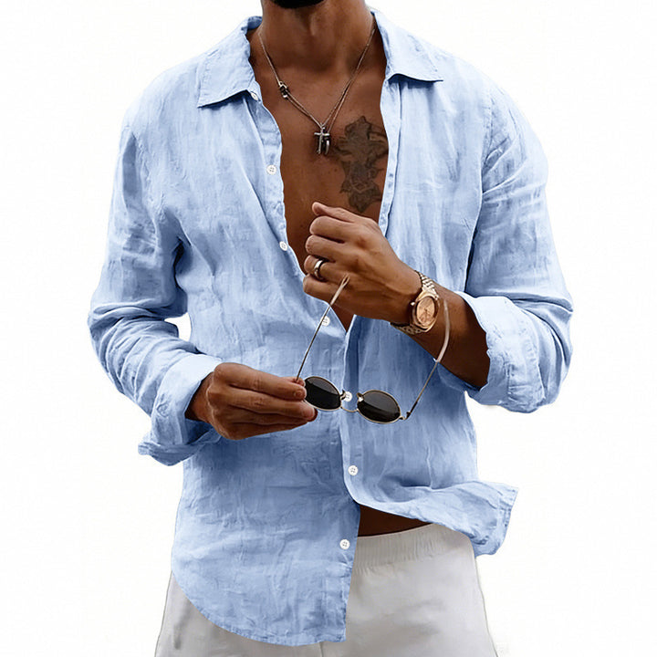 Men's airy relaxed linen shirt with open lapel, rounded hem, and roll-up sleeves StylebySassy