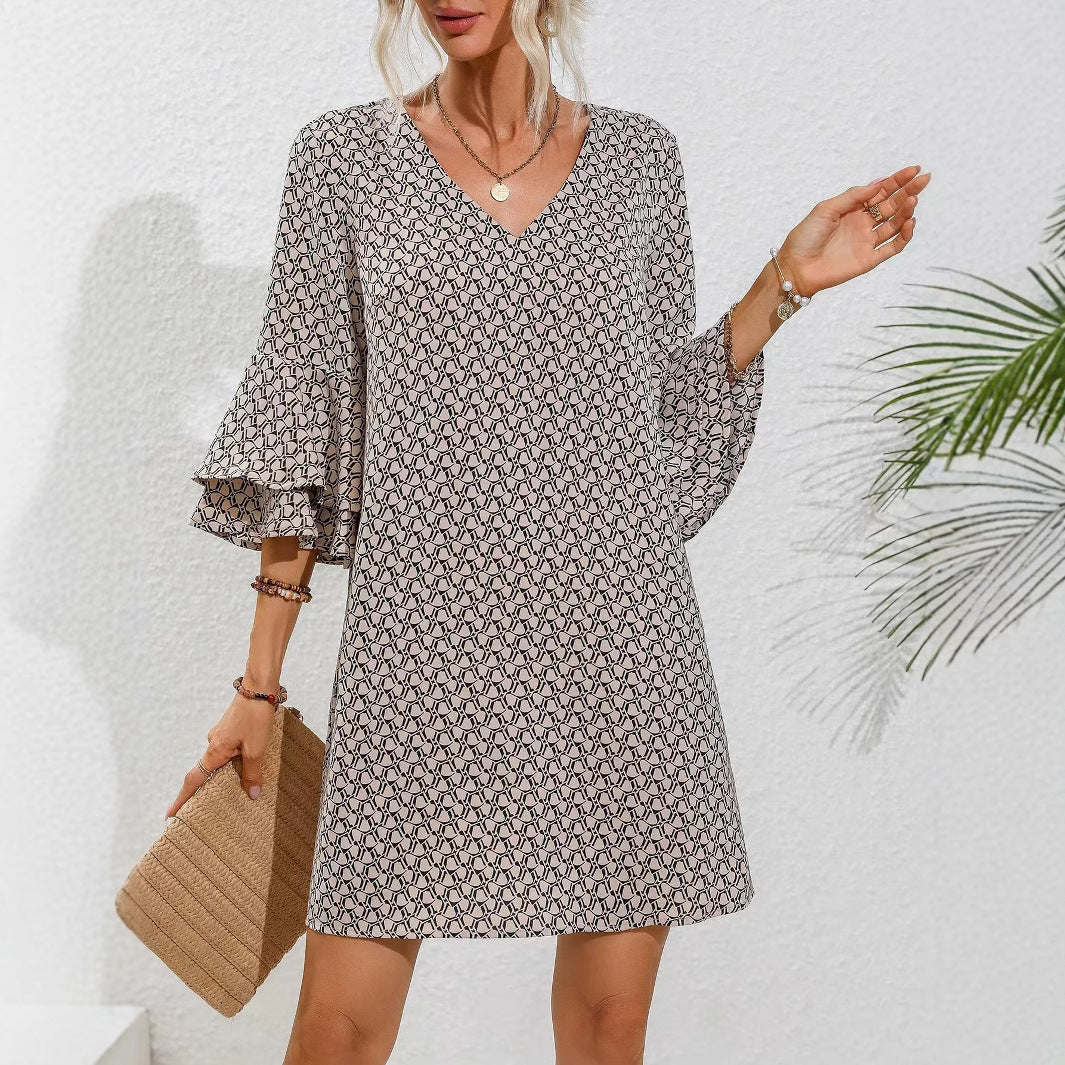 Women's flowing tunic mini dress with V-neck graphic chain pattern and double-layered bell sleeves StylebySassy
