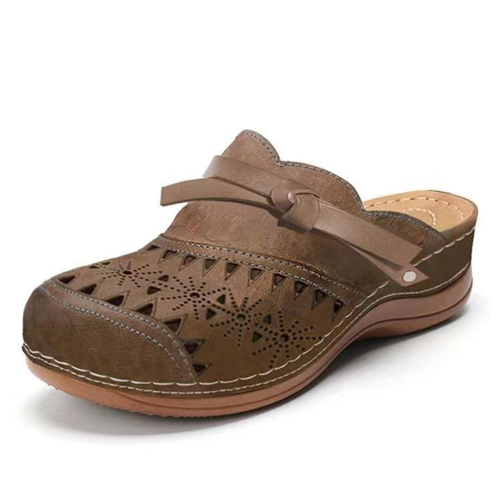 Women Comfortable Clogs with delicate cut-out design and elegant strap StylebySassy