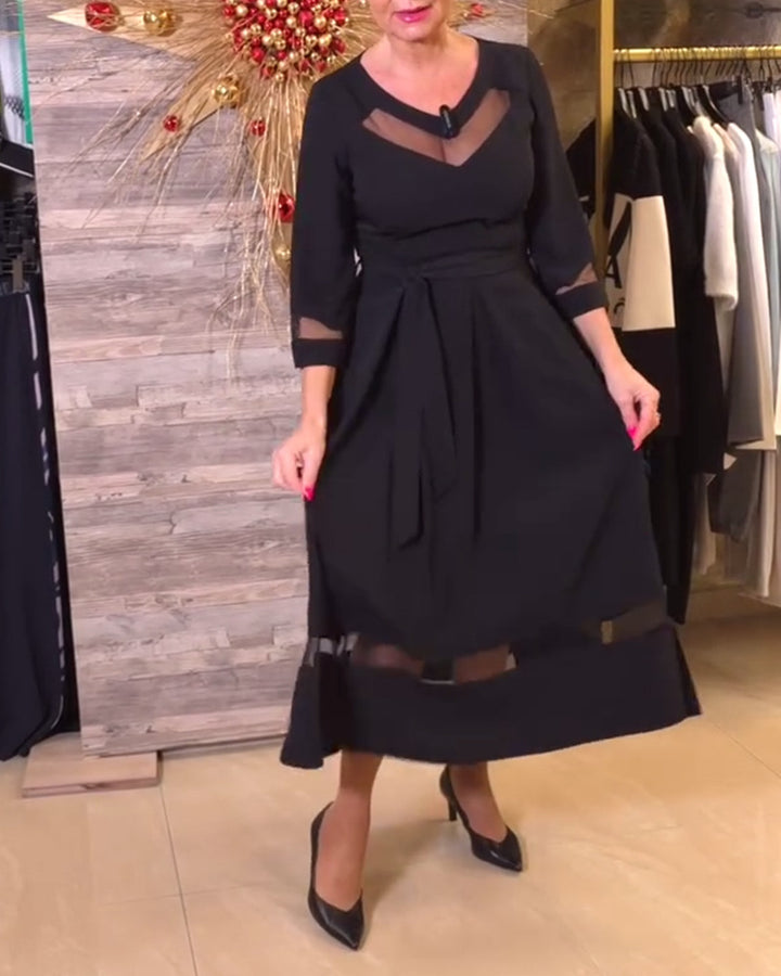 Women's fitted midi dress with transparent mesh inserts, tie belt and feminine A-line StylebySassy