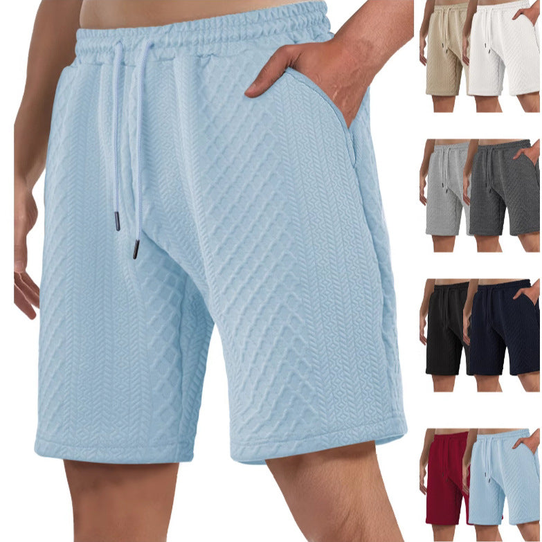 Men's textured beach bermuda shorts made of waffle jersey with elastic drawstring waistband and slanted pockets StylebySassy