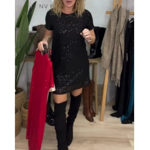 Women's sparkling shift mini dress with sequin trim and transparent hem StylebySassy