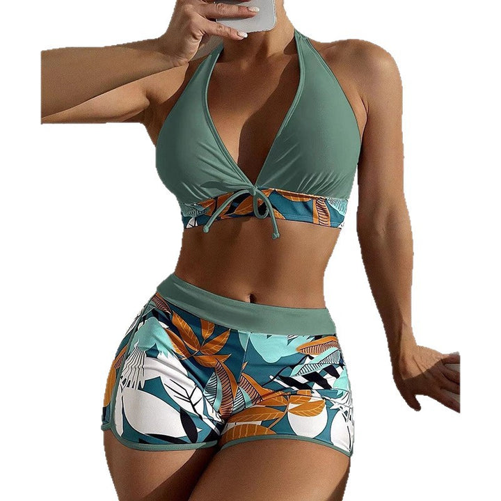 Women's bikini set with sporty high-waist cut and playful floral pattern StylebySassy