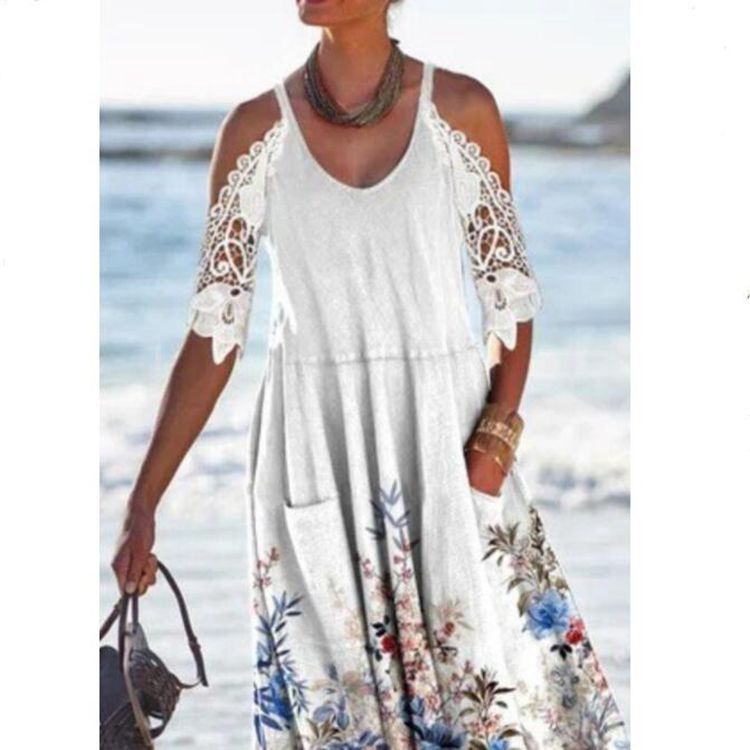Women’s flowing maxi dress with shoulder cutouts crochet lace sleeves A-line cut and side pockets StylebySassy