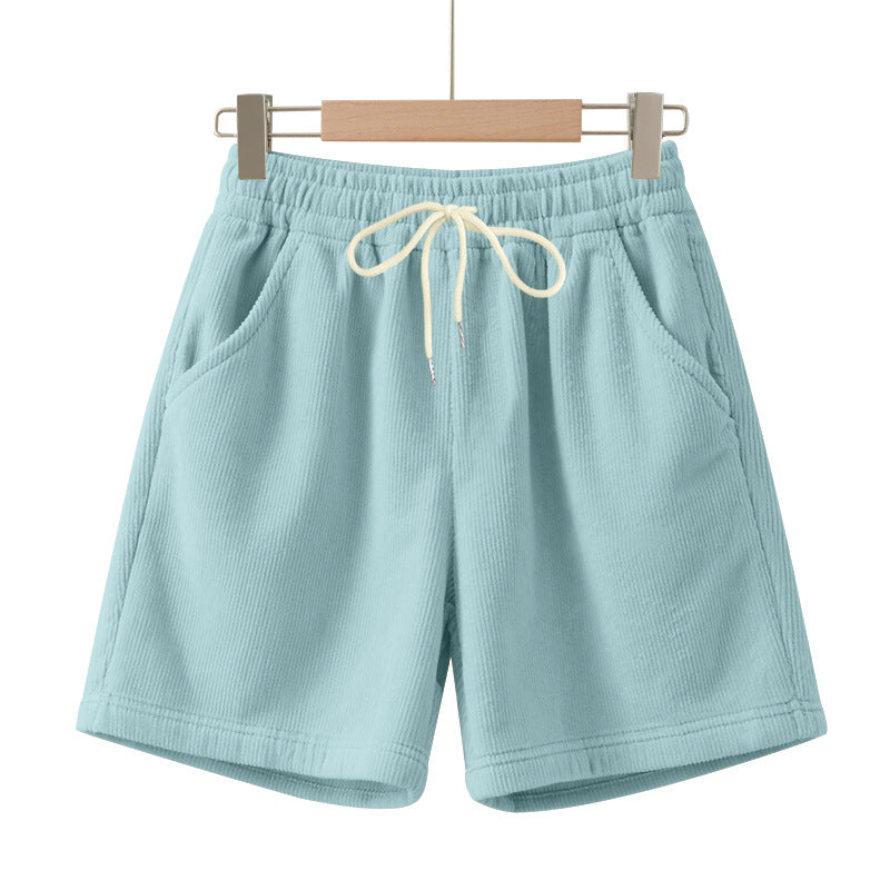 Men's ribbed jersey shorts with elastic waistband, decorative drawstring, and side slant pockets StylebySassy