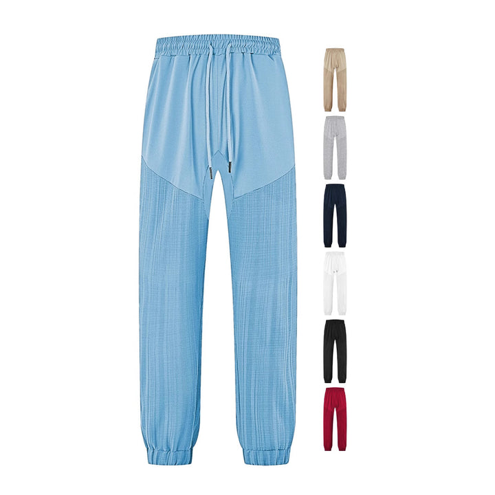 Men's slim-fit jogging pants with elastic drawstring waistband and textured knee panel StylebySassy
