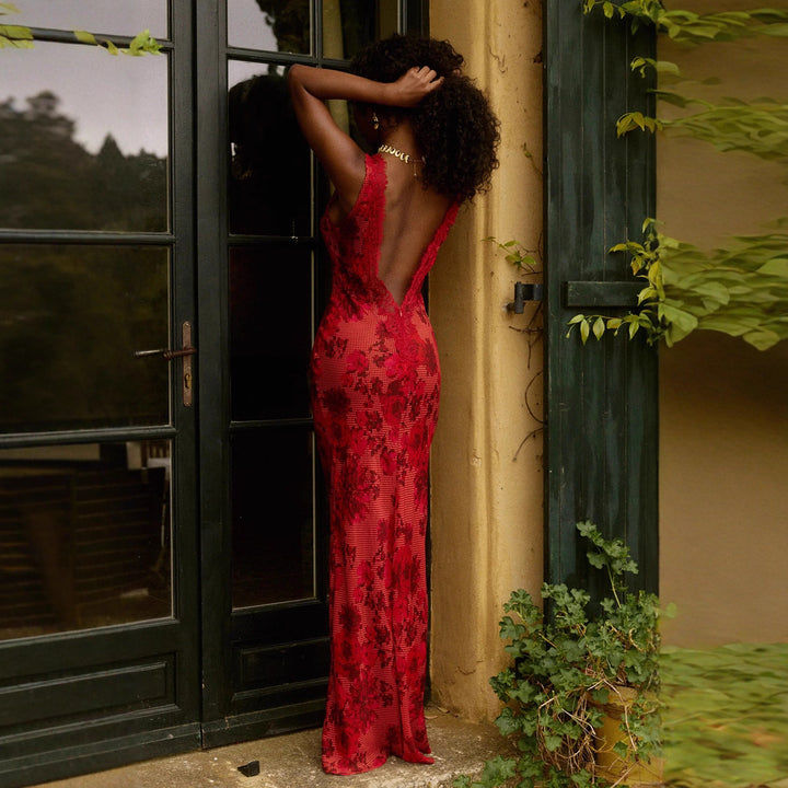 Women's form-fitting evening dress in mermaid cut with deep V-neck and floral lace trim StylebySassy