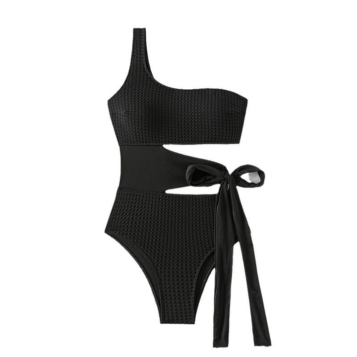 Women's one-piece swimsuit with asymmetrical cut and stylish wrap belt StylebySassy