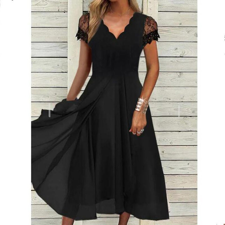 Ladies flowing midi dress with curved V-neck, fitted A-line silhouette, and delicate lace sleeves StylebySassy