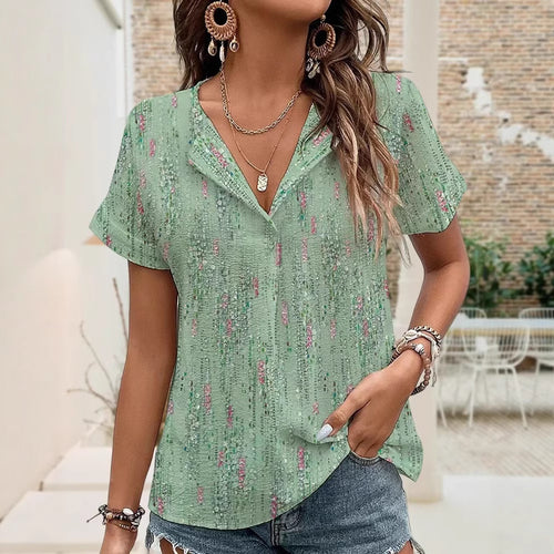 Ladies airy crinkled blouse with slit collar, short wing sleeve and curved hem StylebySassy