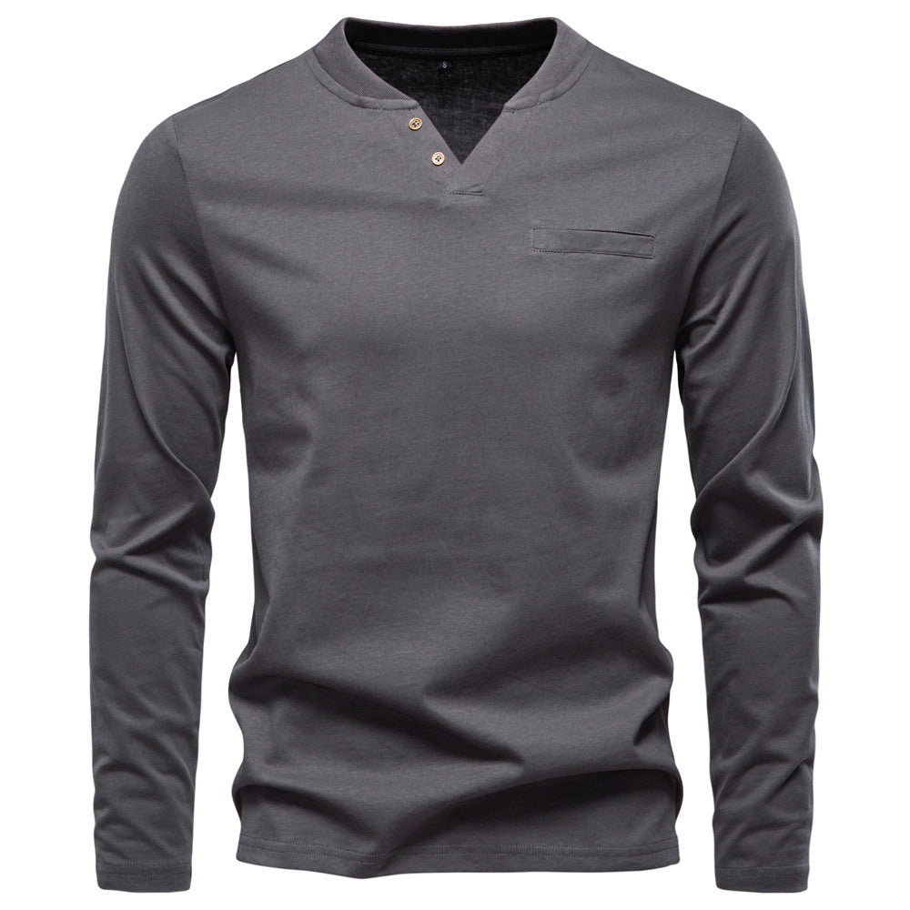 Men's tailored long sleeve shirt in Henley style with short V-neck, decorative buttons, and chest pocket StylebySassy