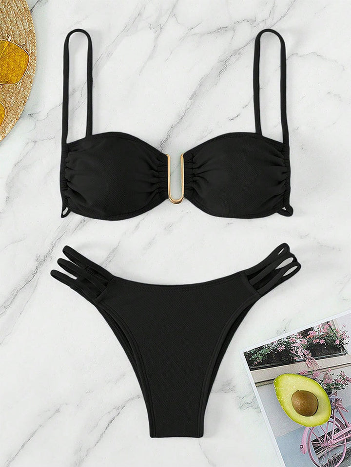 Women's bikini set with modern ruffle details and elegant golden accent StylebySassy