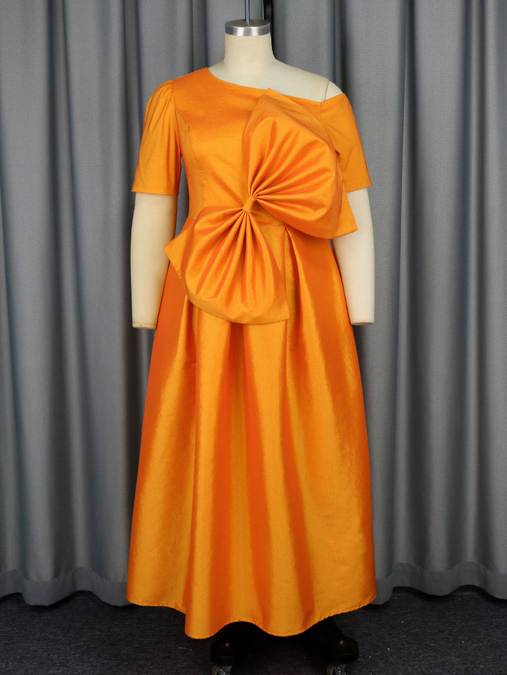 Women's festive evening dress with asymmetric neckline and voluminous draping element StylebySassy