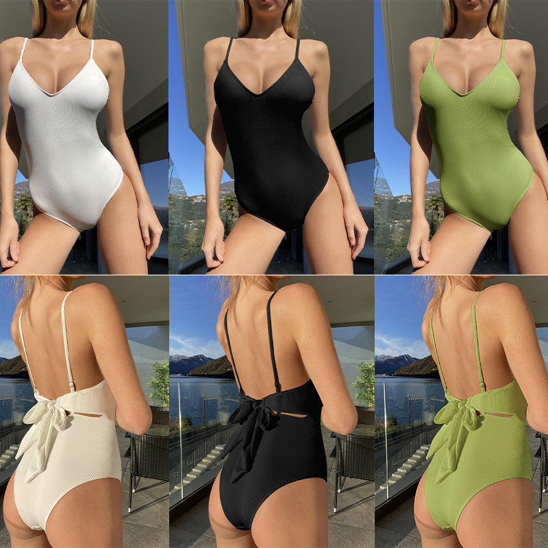 Women's one-piece swimsuit with deep V-neckline and fine ribbed texture StylebySassy