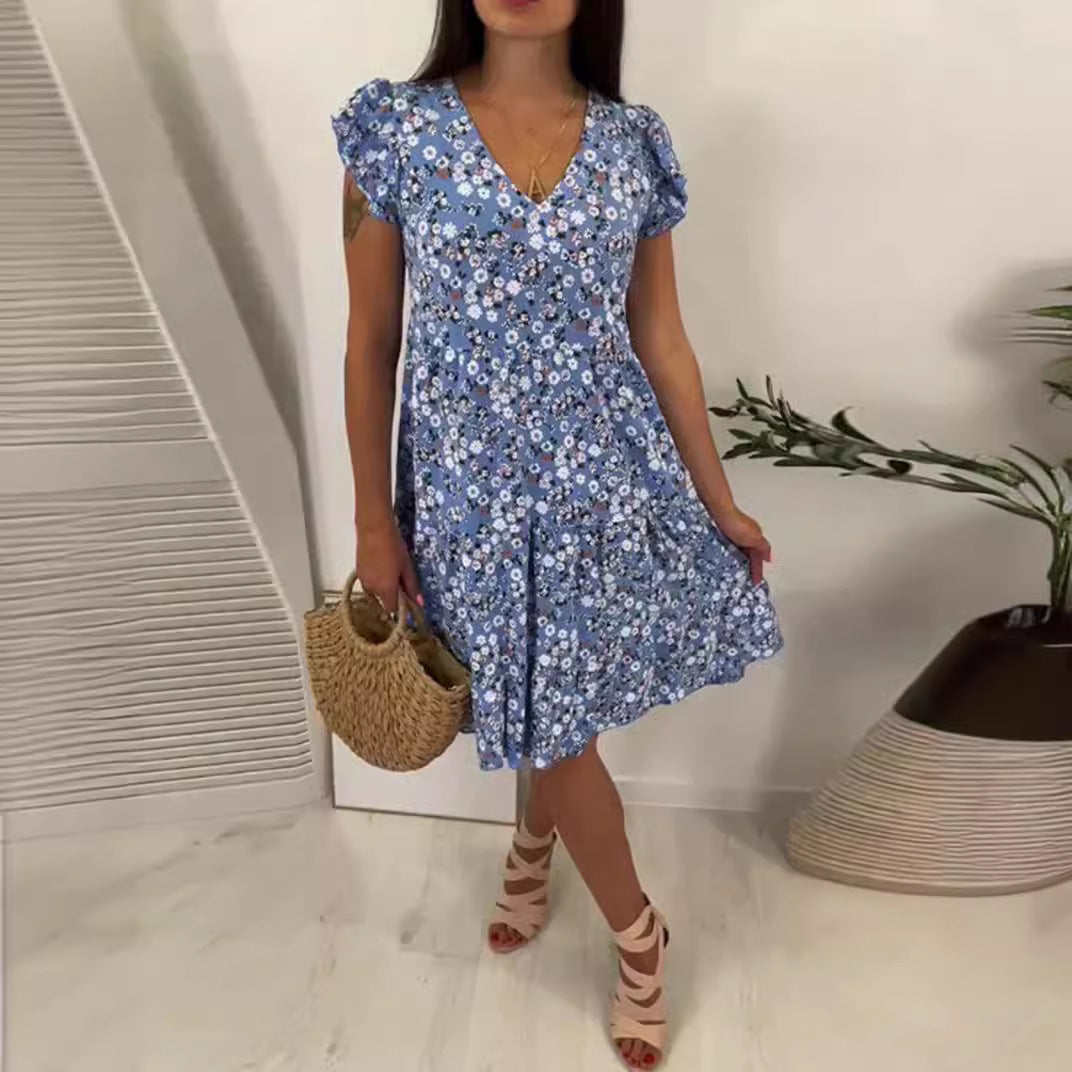 Ladies' V-neck tiered dress with puff sleeves and fitted underbust seam StylebySassy