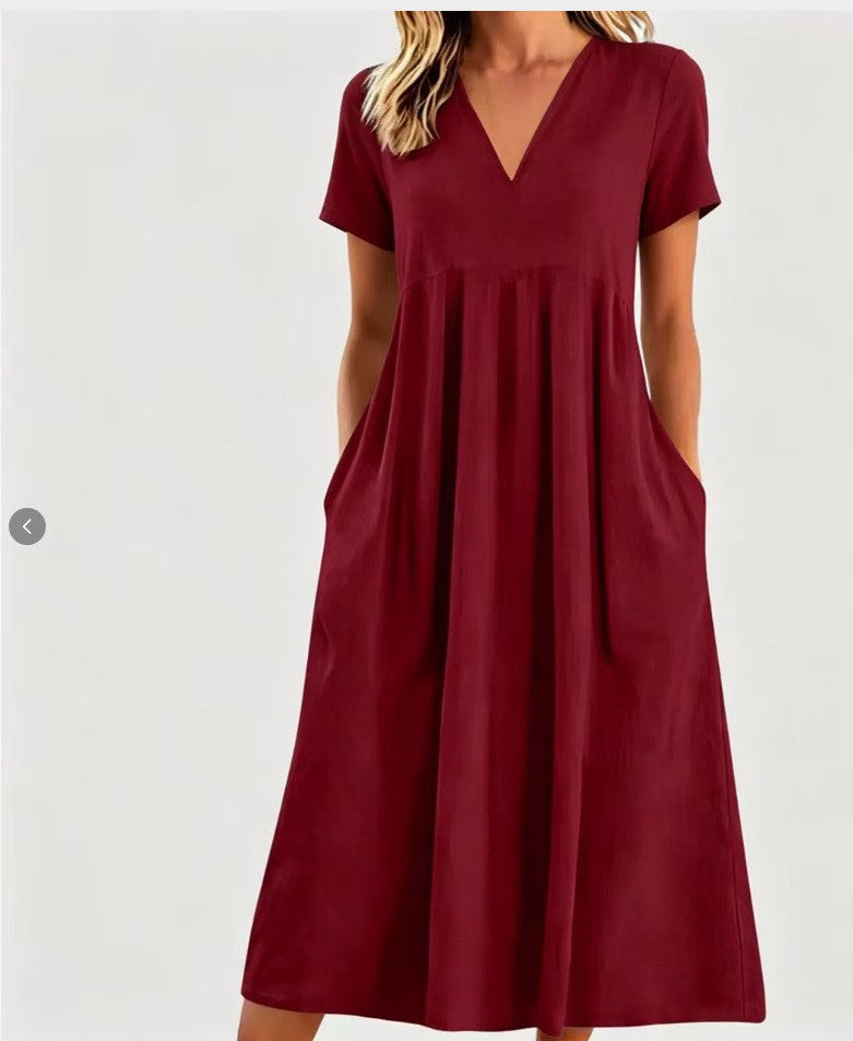 Women nan legeres V-neck midi dress with side pockets and gathered empire seam StylebySassy