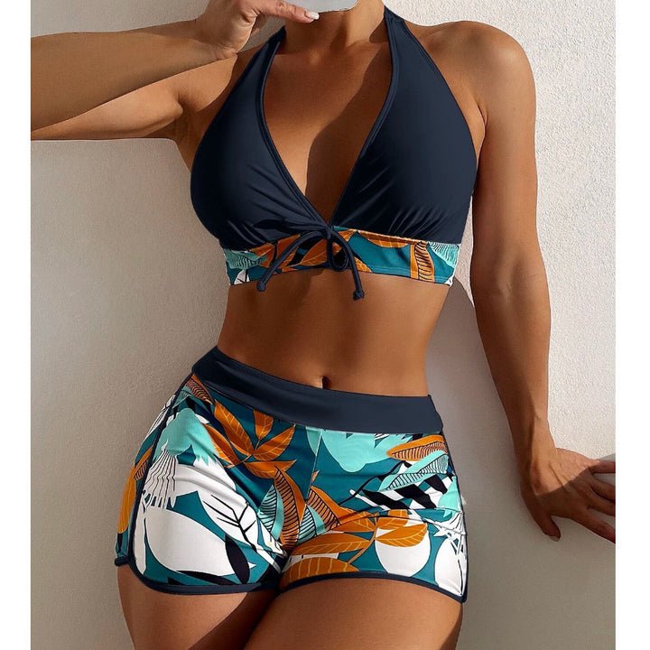 Women's bikini set with sporty high-waist cut and playful floral pattern StylebySassy