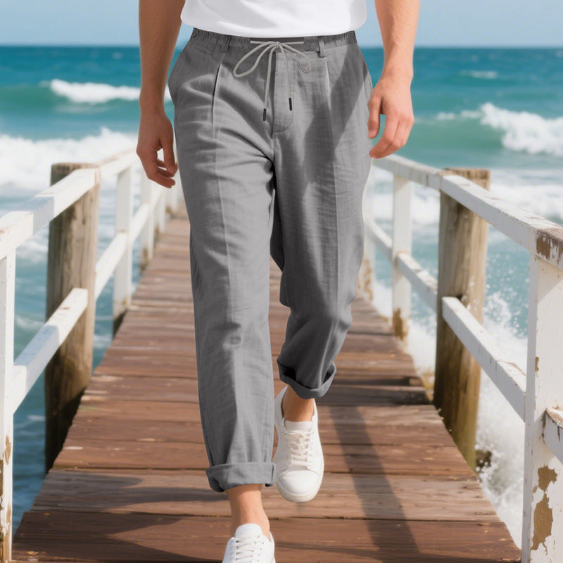 Men's beach-suitable linen blend lounge pants with elastic drawstring, subtle pleat, and rolled ankle hem StylebySassy