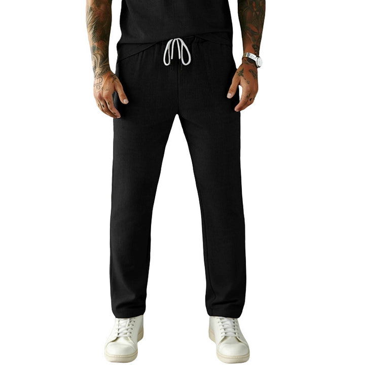 Men's narrow-cut comfort pants with elastic waistband, drawstring, and fine ribbed structure StylebySassy