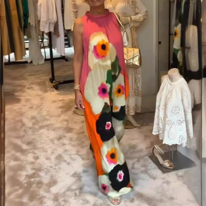 Women's sleeveless maxi dress with ruffled high collar, wide palazzo cut, and large floral print StylebySassy
