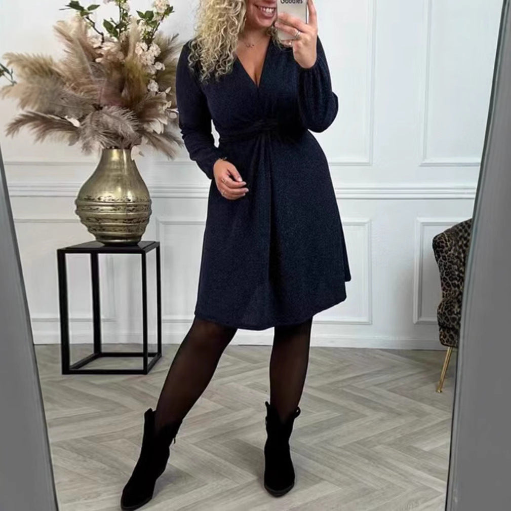 Women's knee-length V-neck dress with gathered waistband made of lightweight glossy knit StylebySassy
