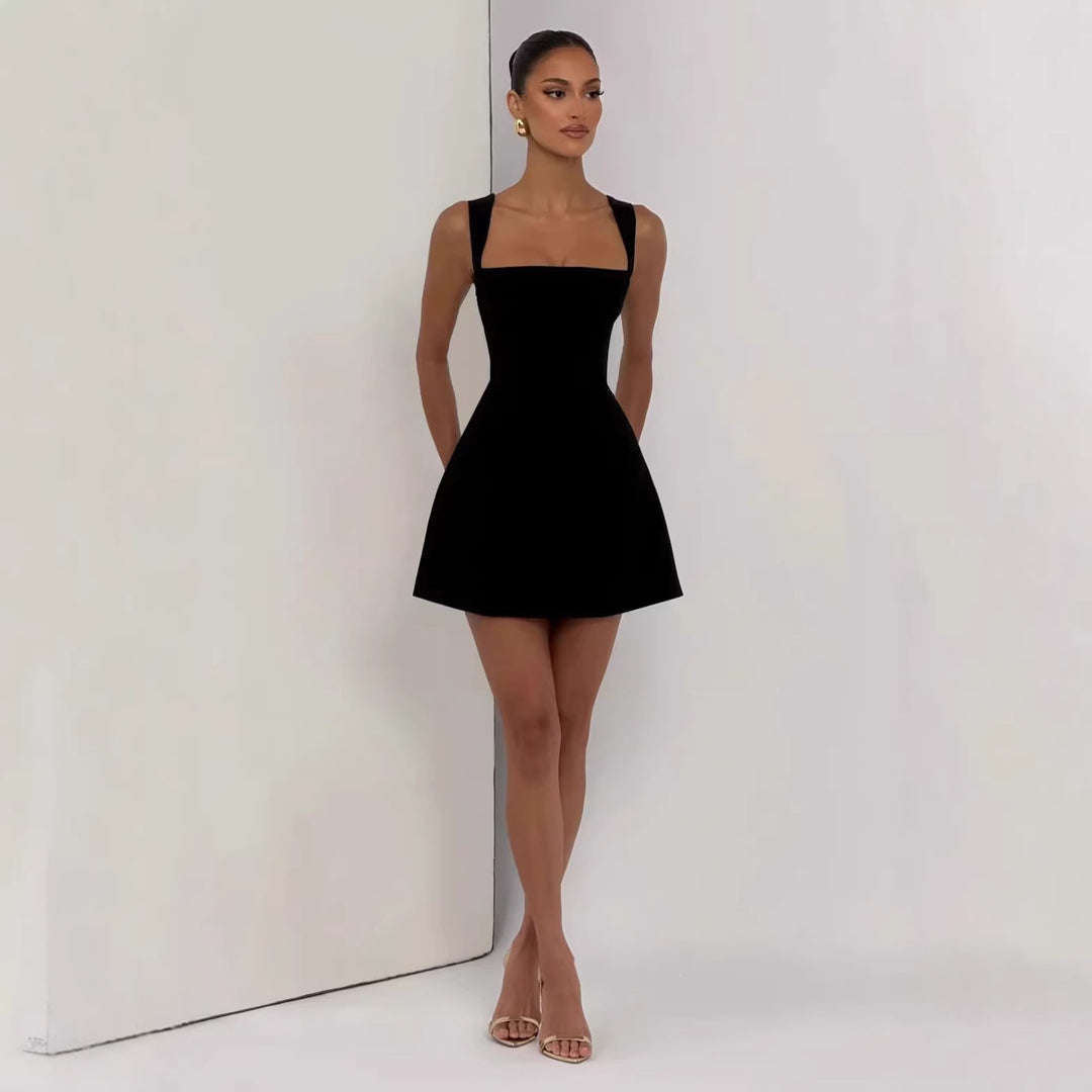 Women's fitted mini dress with wide straps and elegant neckline StylebySassy