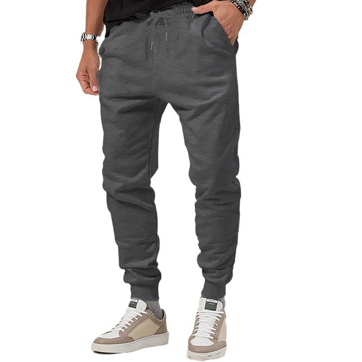 Men's jersey sweatpants in a tapered cut with concealed drawstring and shape-stable ankle cuffs StylebySassy