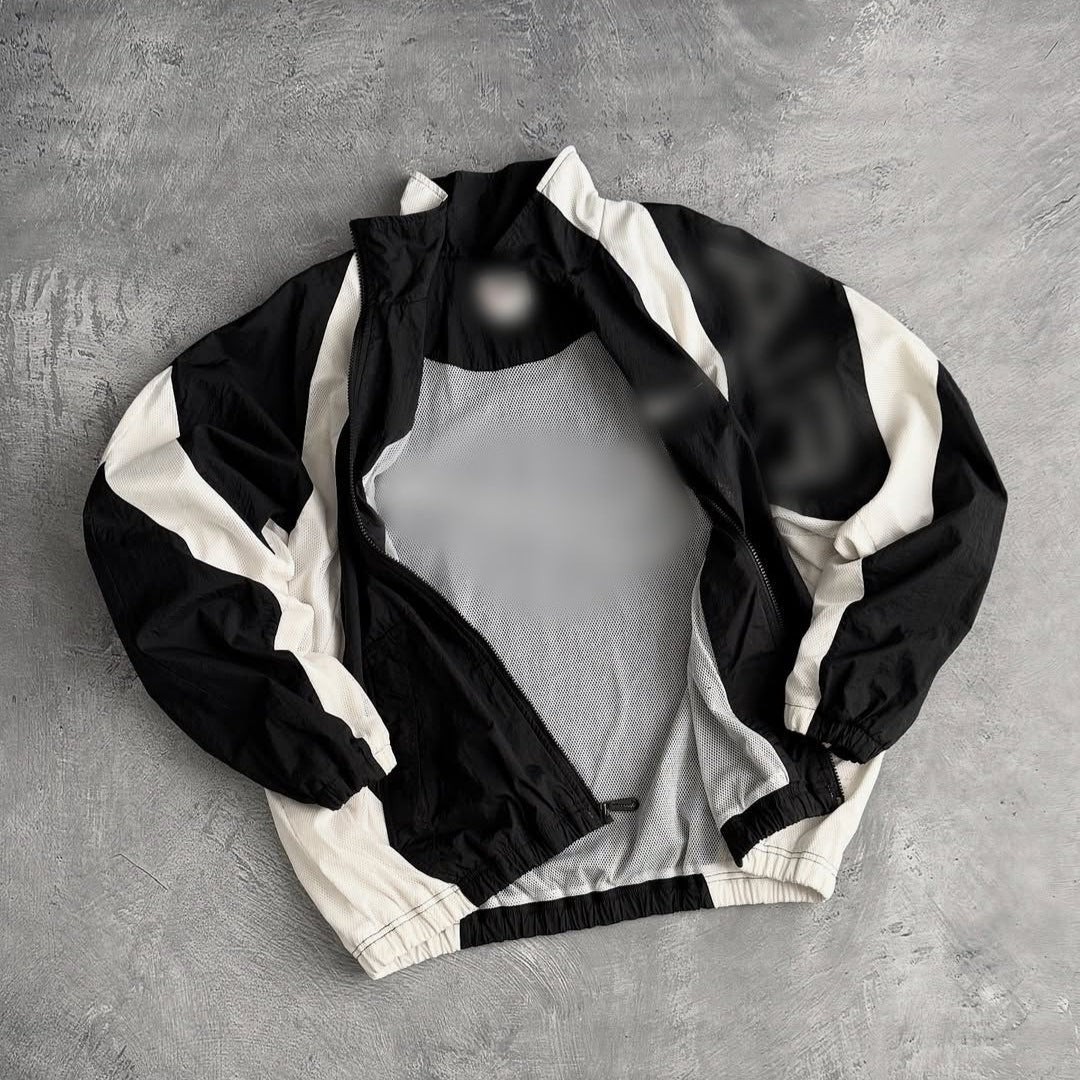 Unisex nan breathable lightweight wind and training jacket with mesh lining, stand collar and elastic hem StylebySassy