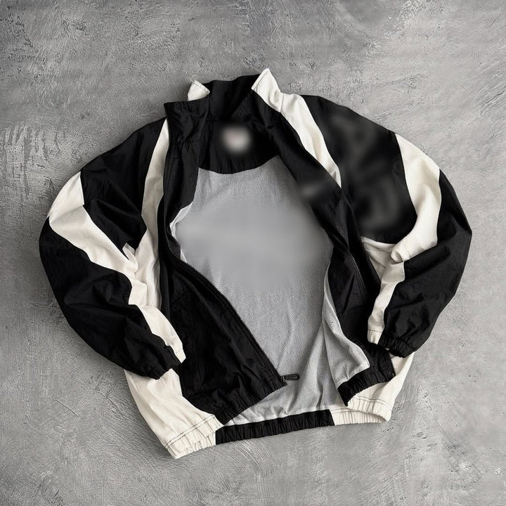 Unisex nan breathable lightweight wind and training jacket with mesh lining, stand collar and elastic hem StylebySassy