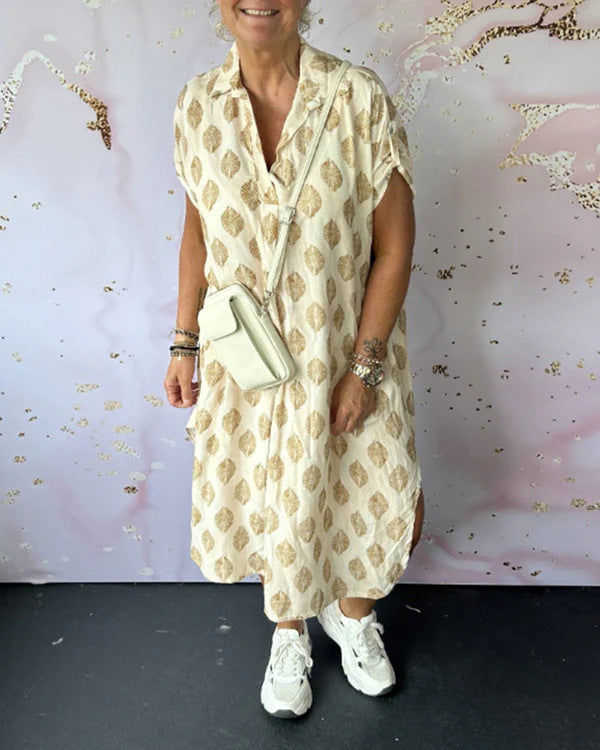 Women's shirt dress similar to a kaftan with V-neck, dropped shoulders, and textured muslin quality StylebySassy