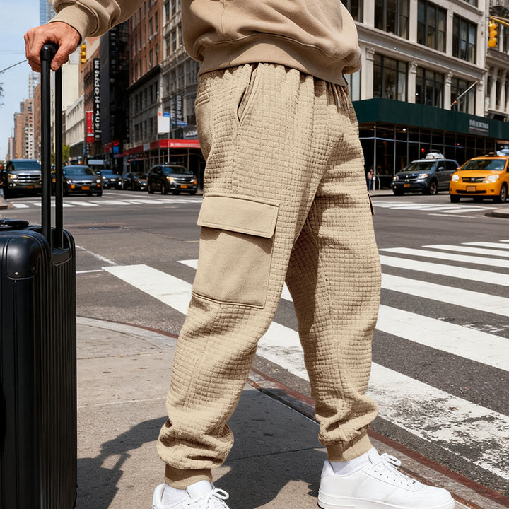 Men's waffle texture cargo pants in jogging style with flap pockets and elastic waistband StylebySassy