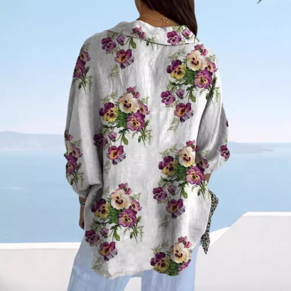Women's lightweight linen-look shirt blouse with floral pattern, loose fit, roll-up sleeves, and patch pockets StylebySassy