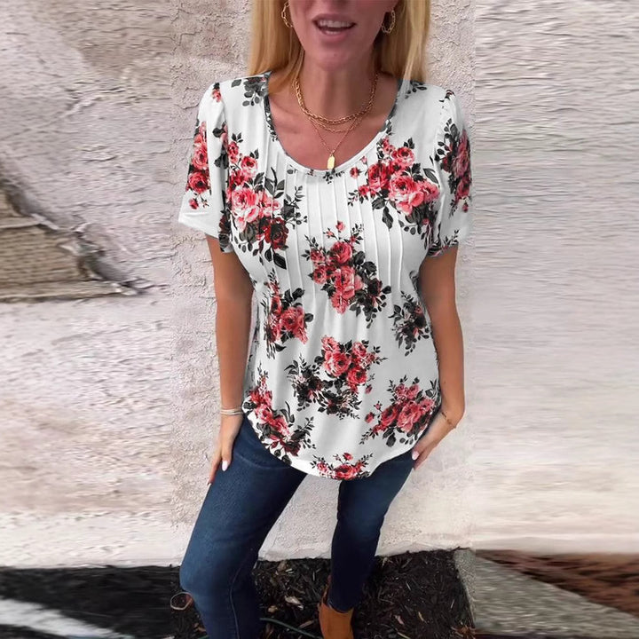 Ladies cropped short sleeve blouse shirt with box pleats and floral print StylebySassy