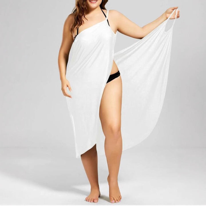 Women's nan versatile beach pareo wrap dress with spaghetti straps and asymmetrical hem StylebySassy