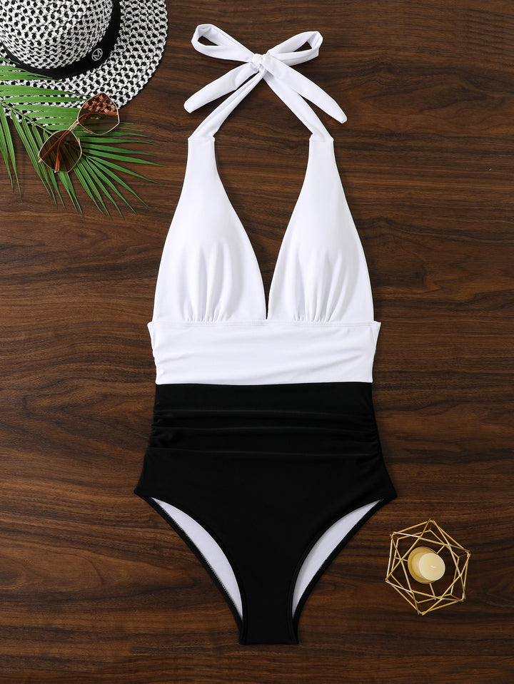 Women's one-piece swimsuit with deep V-neck and striped gathering effect StylebySassy