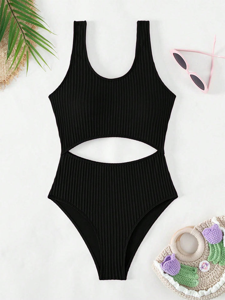Women's one-piece swimsuit with modern cut-out and textured design StylebySassy