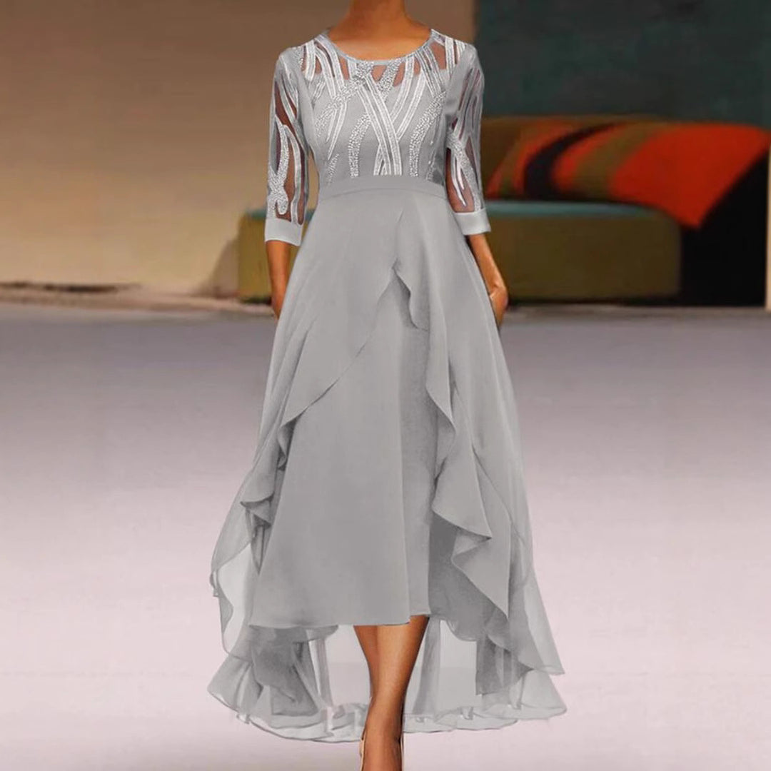 Women's elegant chiffon evening dress with embroidered tulle bodice, three-quarter sleeves, and asymmetric tiered hem StylebySassy