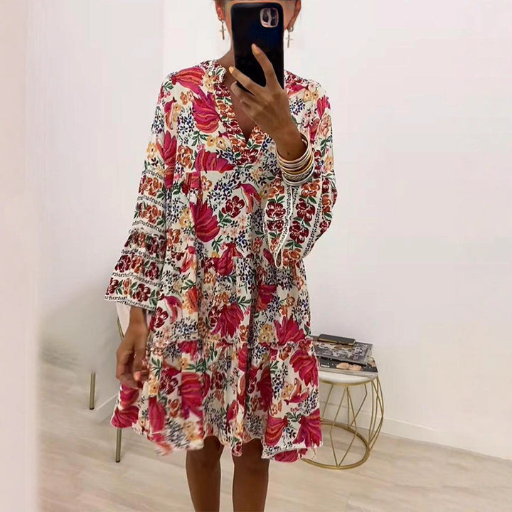 Ladies' floral ruffle mini dress in Boho style with V-neck and tiered silhouette StylebySassy