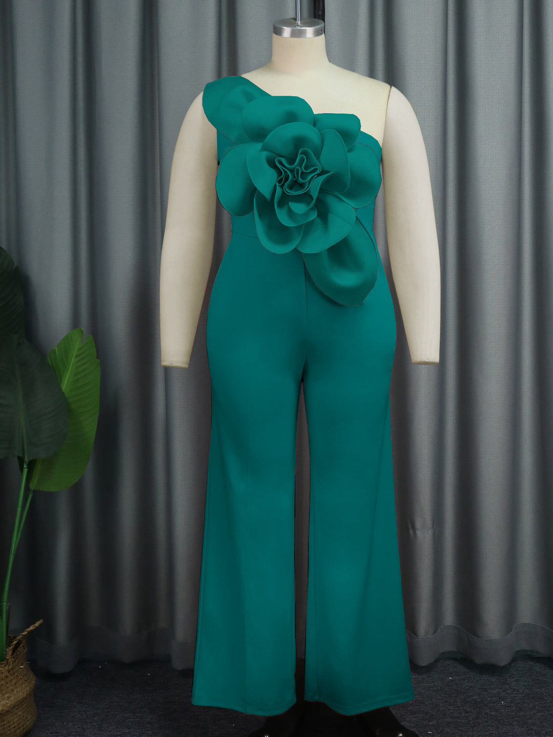 Ladies elegant overall with large floral accent on top