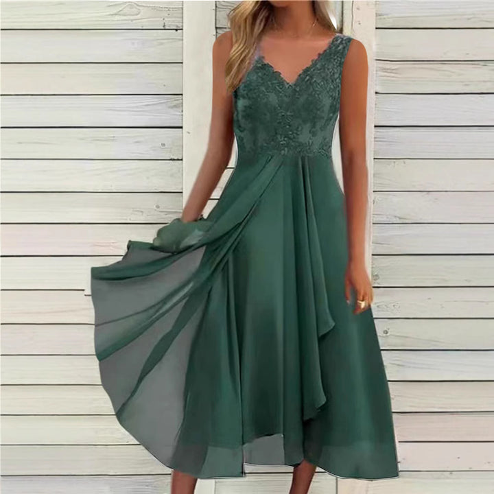 Women's elegant evening midi dress with embroidered lace bodice, tailored draping, and flowing layered skirt StylebySassy