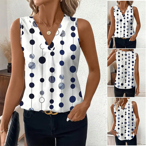 Women's V-neck blouse top with vertical polka dot pattern and subtle center seam StylebySassy