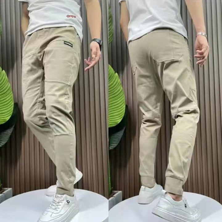 Men's sporty cargo jogger pants with elastic waistband, drawstring, and tapered leg hem StylebySassy