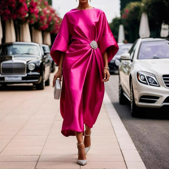 Women's elegant satin kaftan midi dress with kimono sleeves, side draping, and decorative brooch StylebySassy