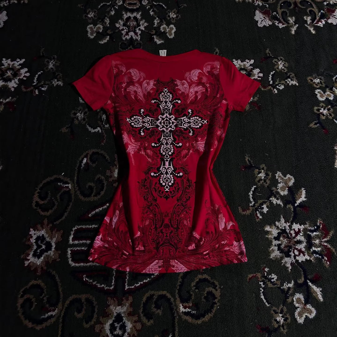 Women's T-shirt with decorative cross design and floral accents StylebySassy